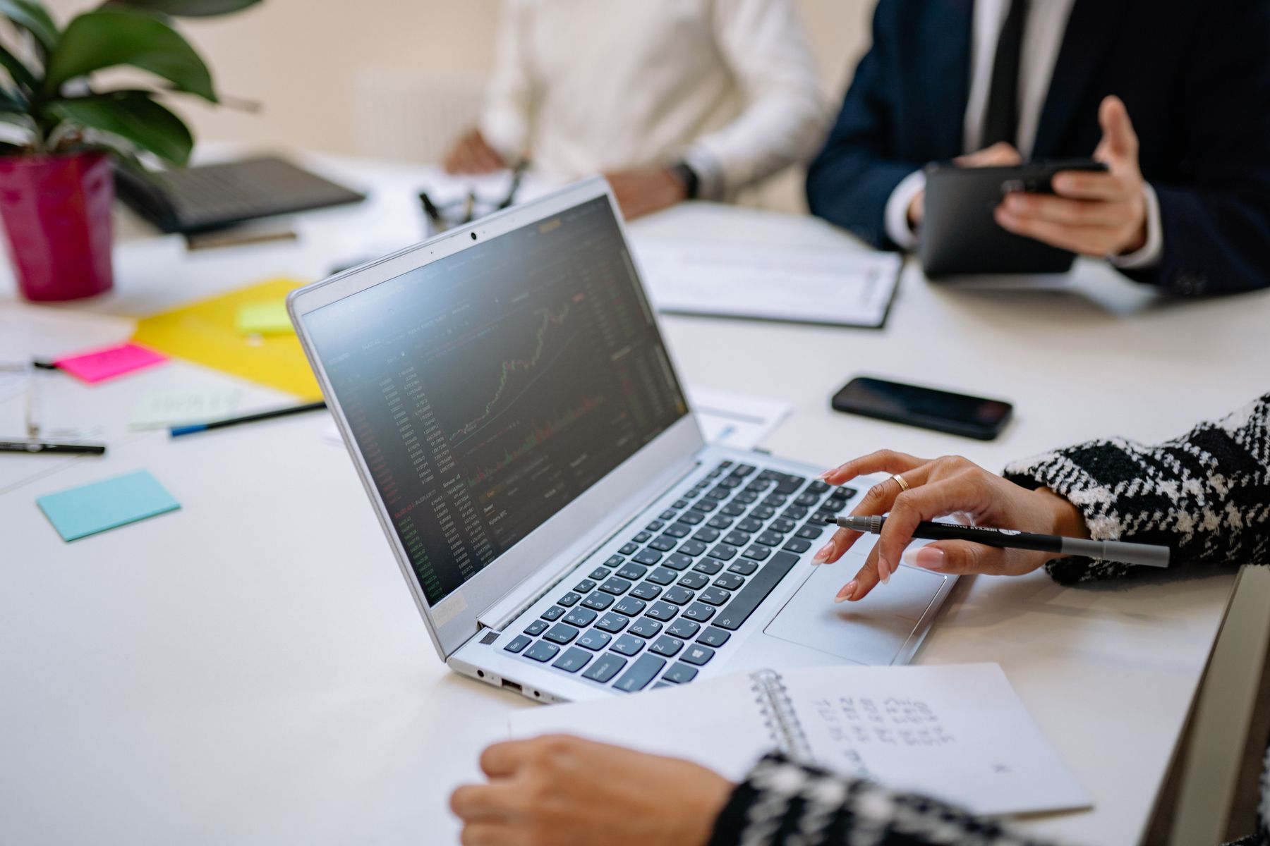 An accountant reviewing a set of financial statements with a small-business owner